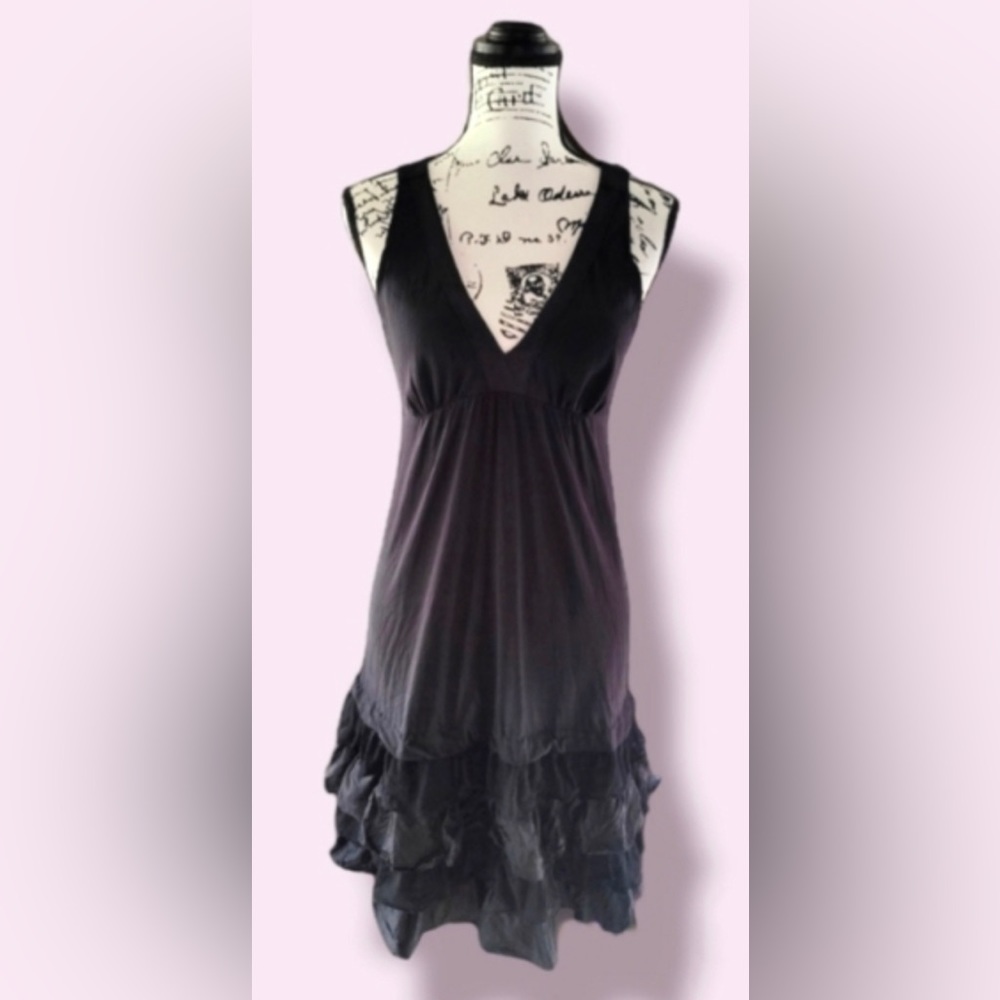 a common thread.  Black Silk, V-neck, sleeveless dress